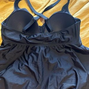 Women’s black tankini and swim short